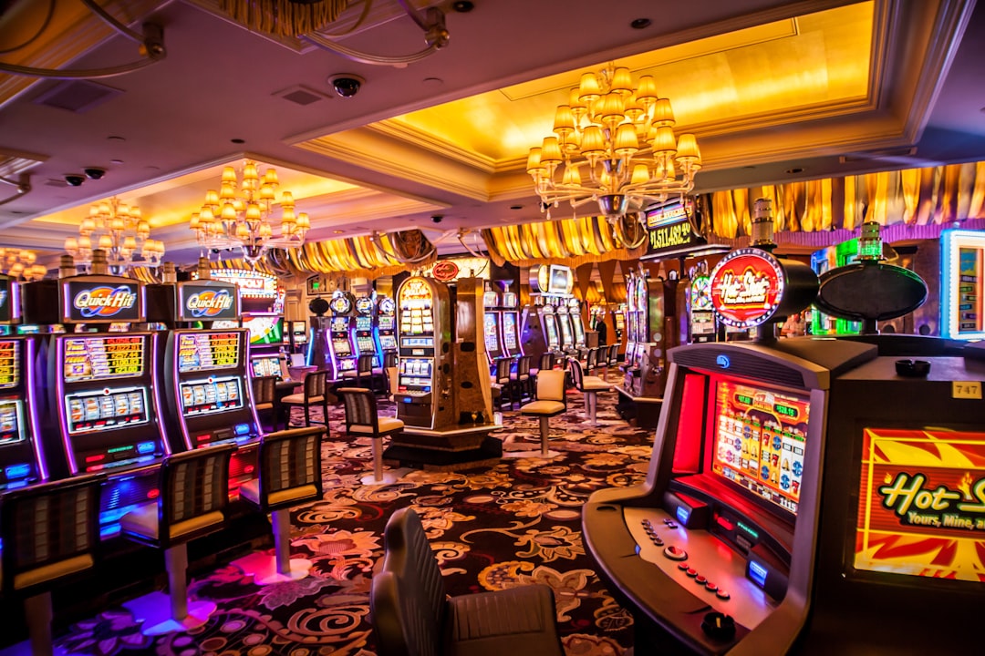 A vibrant casino interior with various slot machines and decorative lighting.